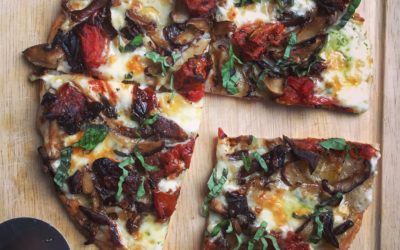 Manini’s Gluten Free Pizza Crust with Wild Mushrooms + Taleggio, Fontina Béchamel & Spicy Tarragon Oil